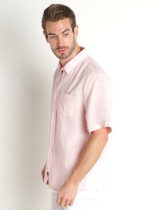 Model in pale pink Benson Miami Short Sleeve Linen Shirt