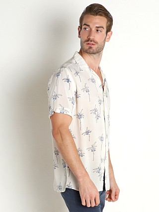 Model in blue trees Benson Rosseau Short Sleeve Shirt