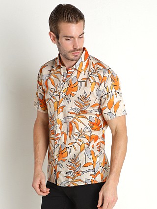 Model in orange tropical Benson Champlain Short Sleeve Shirt