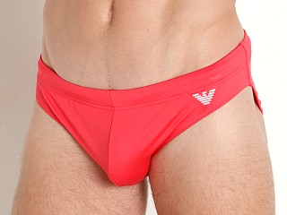 Model in coral Emporio Armani Essential Low Swim Brief