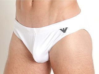 Model in white Emporio Armani Essential Low Swim Brief