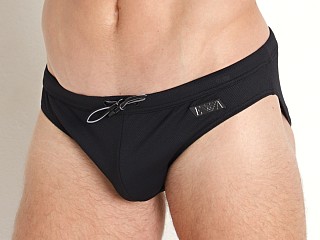 Model in black Emporio Armani  Label Pique Low Swim Brief