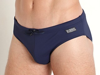 Model in navy blue Emporio Armani Black Label Pique Swim Brief