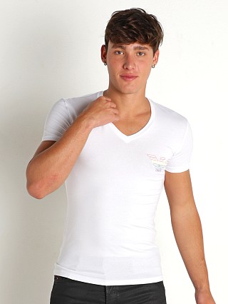 Model in white Emporio Armani Rainbow Logo V-Neck