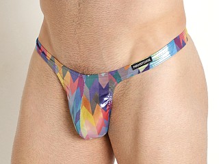 Model in parrot print Manstore Beach Club Shiny Tower Swim Thong