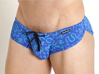 Model in blue print Manstore Beach Club Sprint Swim Brief