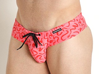 Model in red print Manstore Beach Club Cheeky Swim Brief