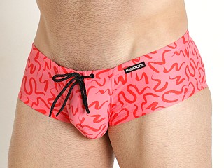 Model in red print Manstore Beach Club Hot Pants Swim Trunk