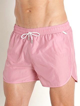 Model in mauve Manstore Beach Club Swim Shorts