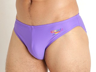 Model in wicked purple Speedo Pride Graphic 1" Solar Brief