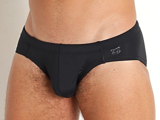 Model in black Nasty Pig Core Swim Bikini