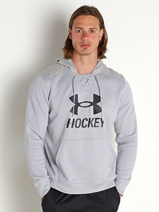 Model in mod gray Under Armour Hockey Icon Hoodie