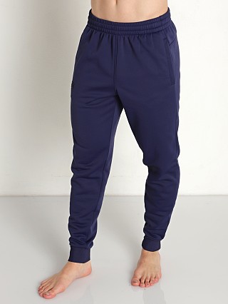 Model in midnight navy Under Armour Fleece Jogger Pants