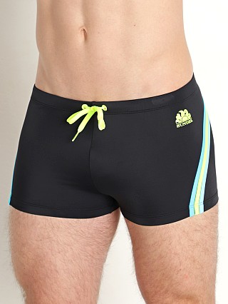 Model in black #35 Sundek 9" Zion Three Stripe Swim Trunk