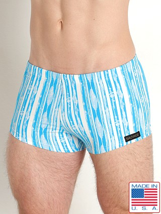 Model in blue/white Sauvage Italian Santorini Square Cut Swim Trunk