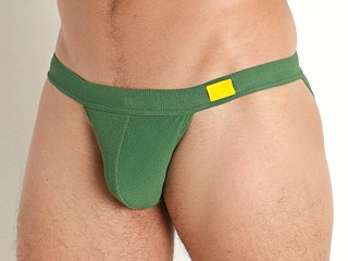 Model in green Modus Vivendi Towel Tanga Swim Brief