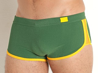 Model in green Modus Vivendi Towel Short Swim Trunk