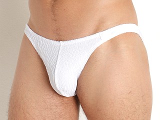 Model in white Modus Vivendi Wavy Low Cut Swim Brief