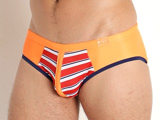 Model in red Modus Vivendi Marine Combo Swim Brief /Orange