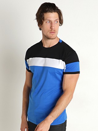 Model in chelsea blue/black Nasty Pig Alliance Color Block T-Shirt