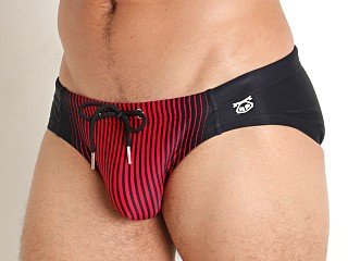 Model in black/red Nasty Pig Verge Swim Bikini