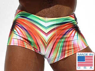 Model in multi-color Rufskin Mozo Print Swim Trunk