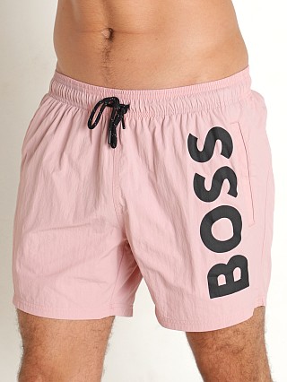 Model in pastel pink Hugo Boss Octopus Swim Shorts