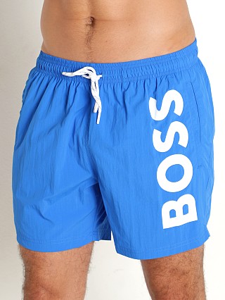 Model in bright blue Hugo Boss Octopus Swim Shorts