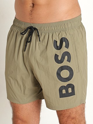 Model in pastel green Hugo Boss Octopus Swim Shorts