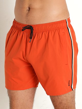 Model in dark orange Hugo Boss Iconic Swim Shorts