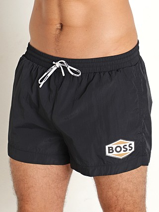 Model in black Hugo Boss Pacific Swim Shorts