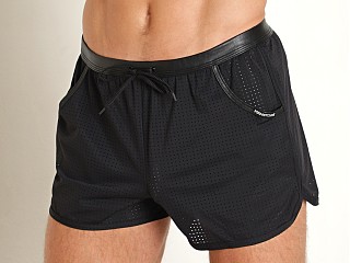 Model in black Manstore Faux Leather/Mesh Sport Shorts