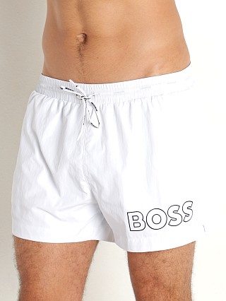 Model in white Hugo Boss Mooneye Swim Shorts