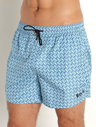 Model in turquoise Hugo Boss Todd Swim Shorts