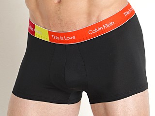 Model in black w/ cherry tomato Calvin Klein Pride Micro Low Rise Trunk