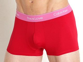 Model in persian red Calvin Klein Pride Micro Low Rise Trunk