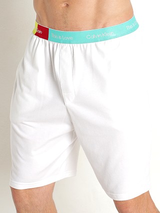 Model in white Calvin Klein Pride Lounge Sleep Short