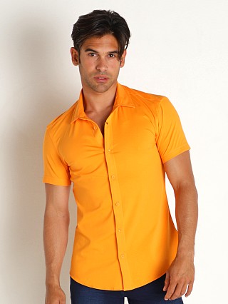 Model in papaya St33le Solid Stretch Jersey Knit Short Sleeve Shirt