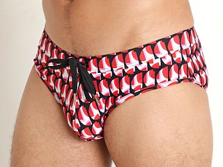 Model in poppy/black circle slice St33le Freestyle Up-Lift Swim Brief Poppy/Black