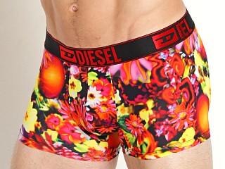 Model in red psychedelic floral Diesel Damien Trunk