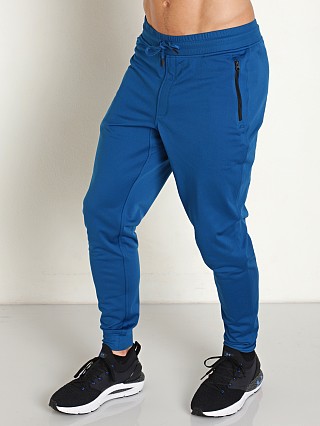 Model in varsity blue Under Armour Sportstyle Joggers