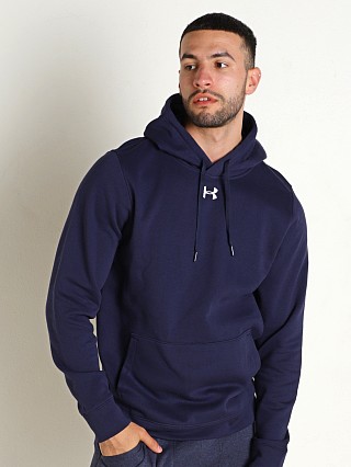 Model in midnight navy Under Armour Hustle Fleece Hoodie