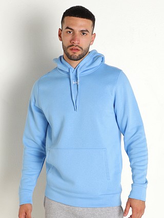 Model in carolina blue Under Armour Hustle Fleece Hoodie