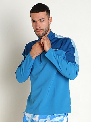 Model in varsity blue/blizzard Under Armour Storm Windstrike Jacket