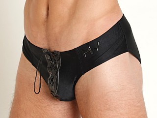 Model in black Modus Vivendi Boudoir Lace-Up Classic Brief