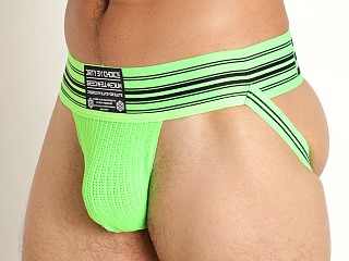 Model in neon green Breedwell Cumdump Jockstrap