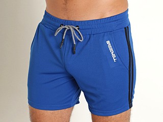 Model in blue Breedwell Sup Shorts