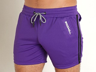 Model in purple Breedwell Sup Shorts