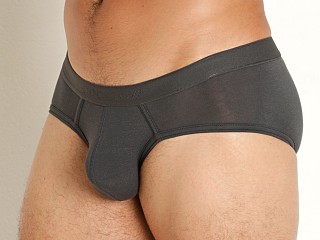 Model in charcoal grey Cocksox Natural Origins Enhancer Pouch Sports Brief Charcoal