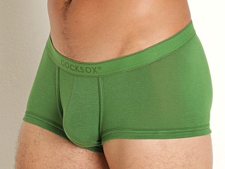 Model in rainforest green CockSox Natural Origins Enhancer Pouch Trunk